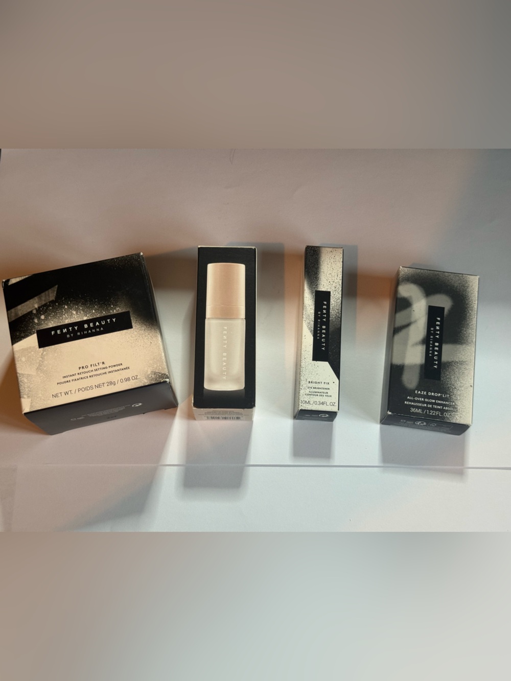 Fenty Beauty Lot Setting Powder, Concealer, Primer, Glow Drops Shade Butter 02